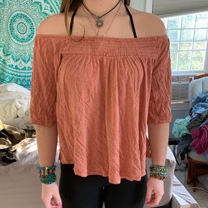 America Eagle peach off the shoulder shirt.